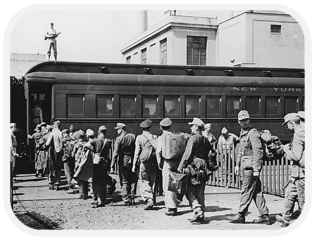 German POW's boarding a Pullman Car in NY for transport to their assigned internment camp.